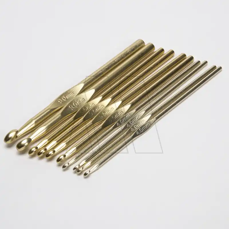AGUJAS CROCHET SILVER DORADA Nº9 X 12UN 1679.9