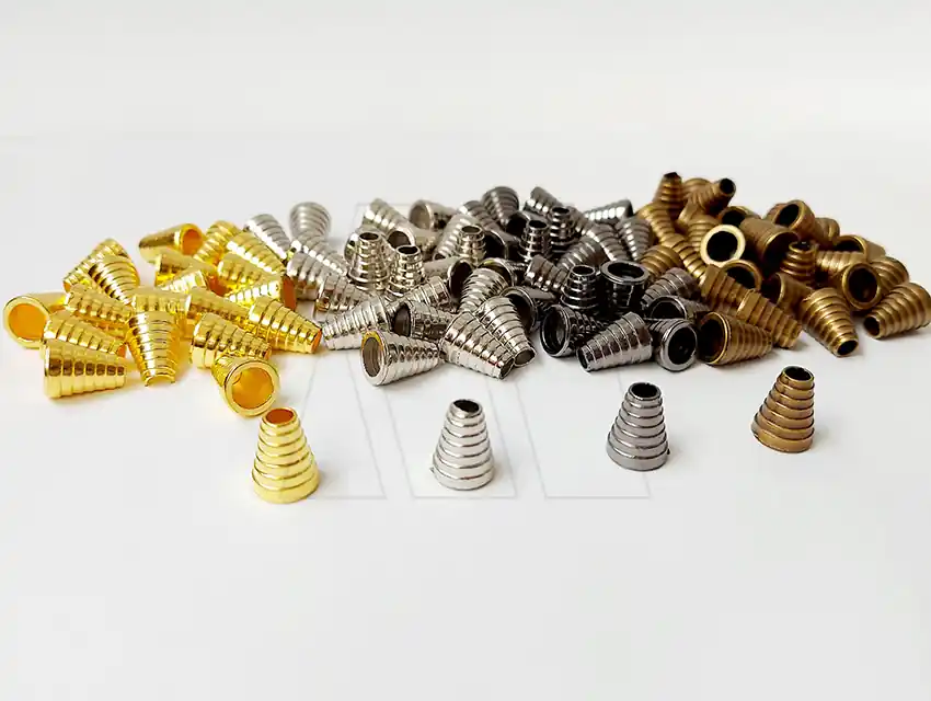 TERMINAL DE CORDON NYLON SIMIL METALICO X DOC 701