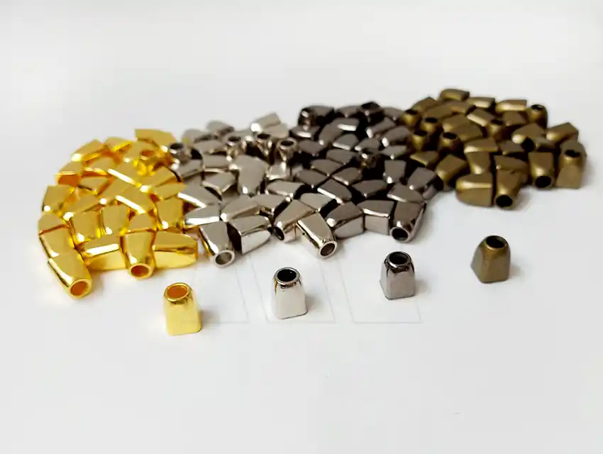 TERMINAL DE CORDON NYLON SIMIL METALICO X DOC 704
