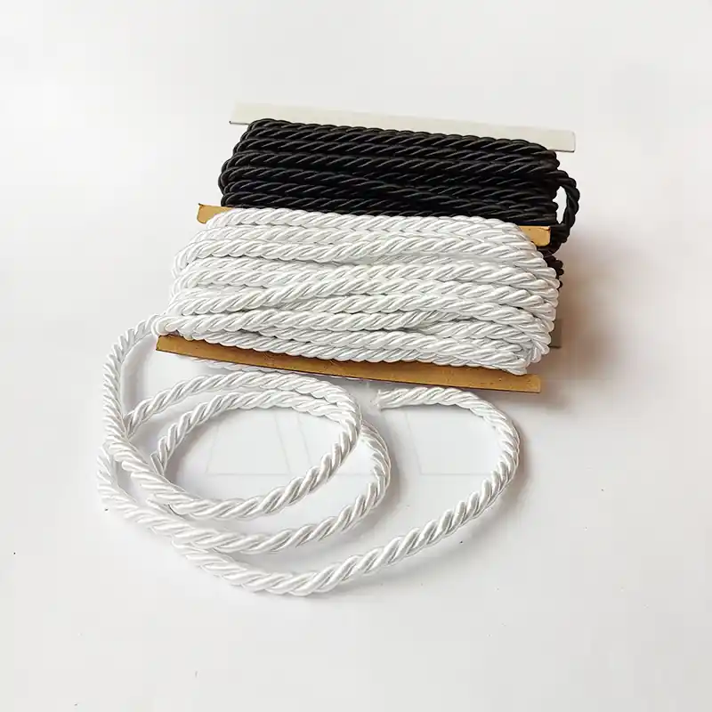 CORDON RAYON COMUNION TRENZADO BLANCO-NEGRO 8MM X 10MTS 2106