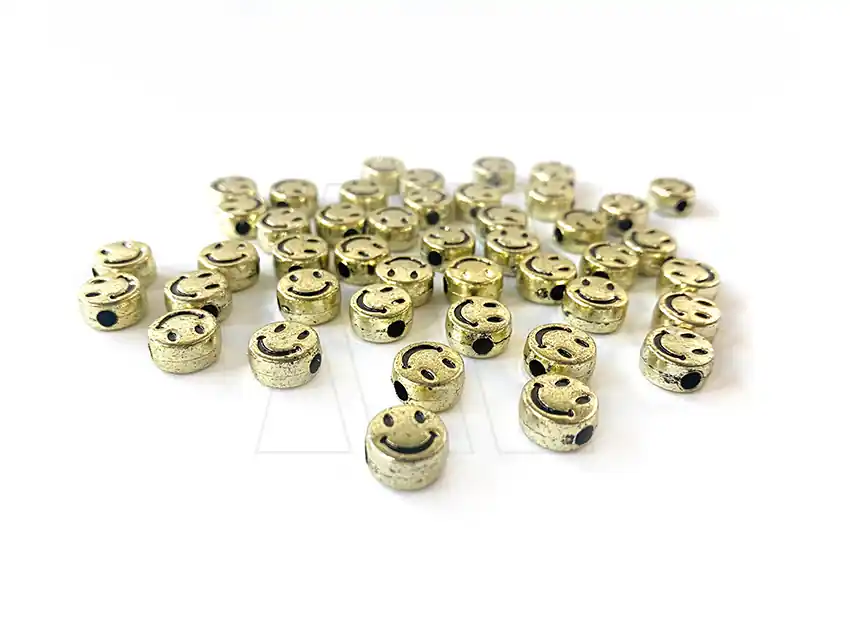 CUENTAS DE PLASTICO CARITA FELIZ DORADA 10MM X 125GRS 8950.M49