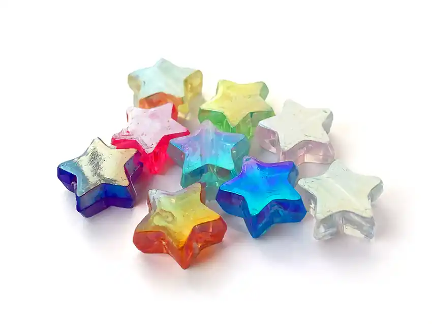  CUENTAS DE PLASTICO TORNASOLADAS ESTRELLAS 11MM X 125GRS  8950.M86